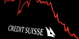 logo du crédit suisse avec une courbe rouge descendante
